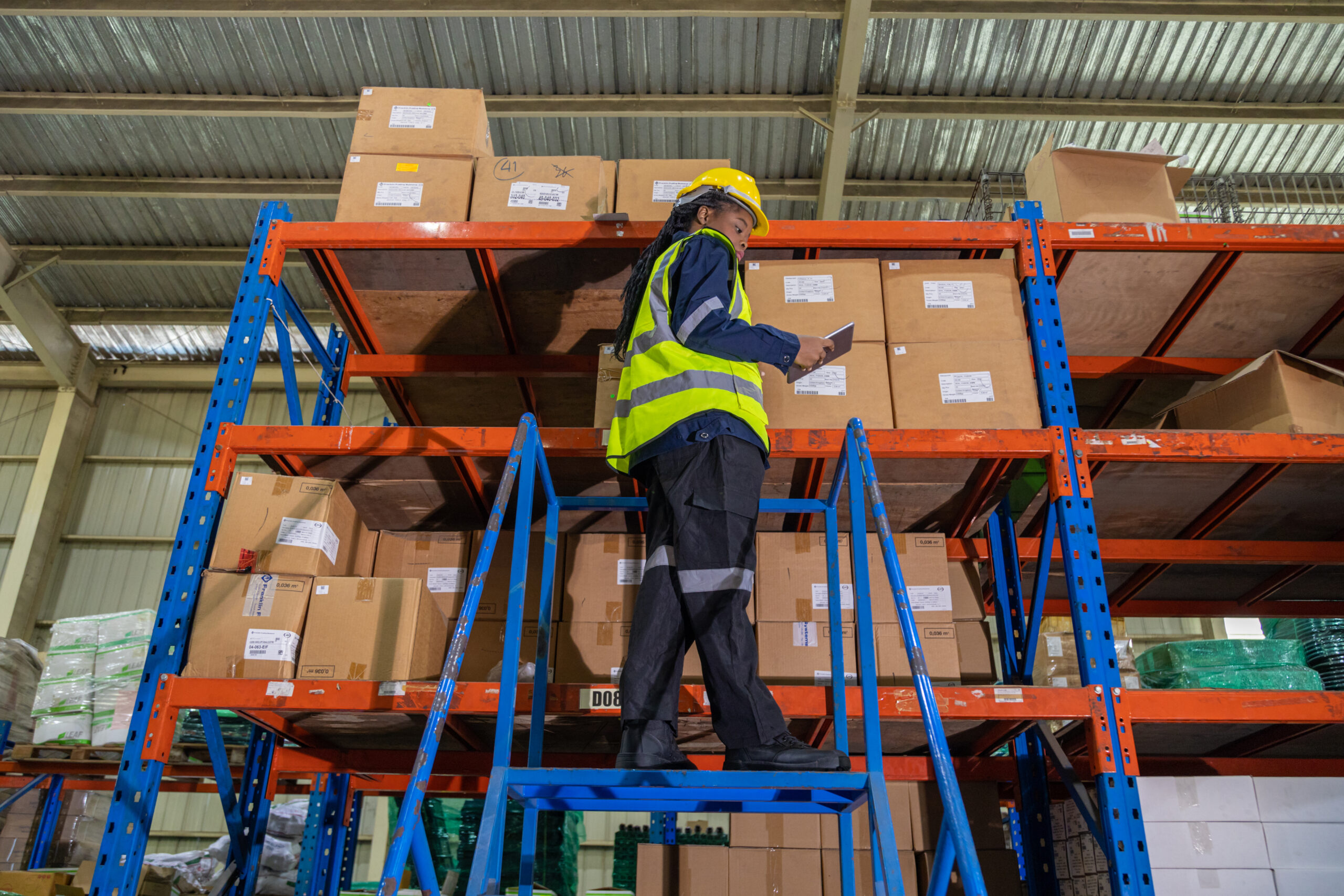 Store clerks inspect products, warehouses, industrial and logistics supply chains.